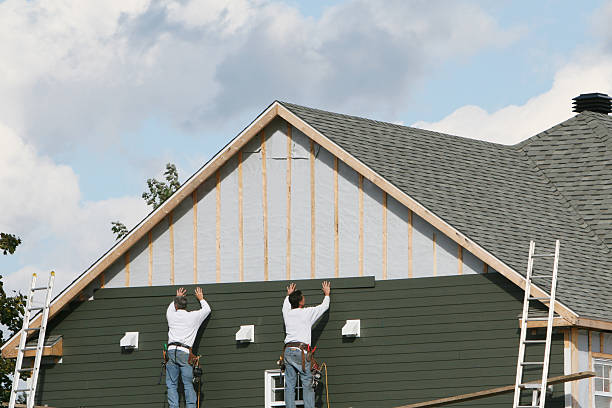 Professional Storm Damage Siding Repair technician working in McSherrystown, PA